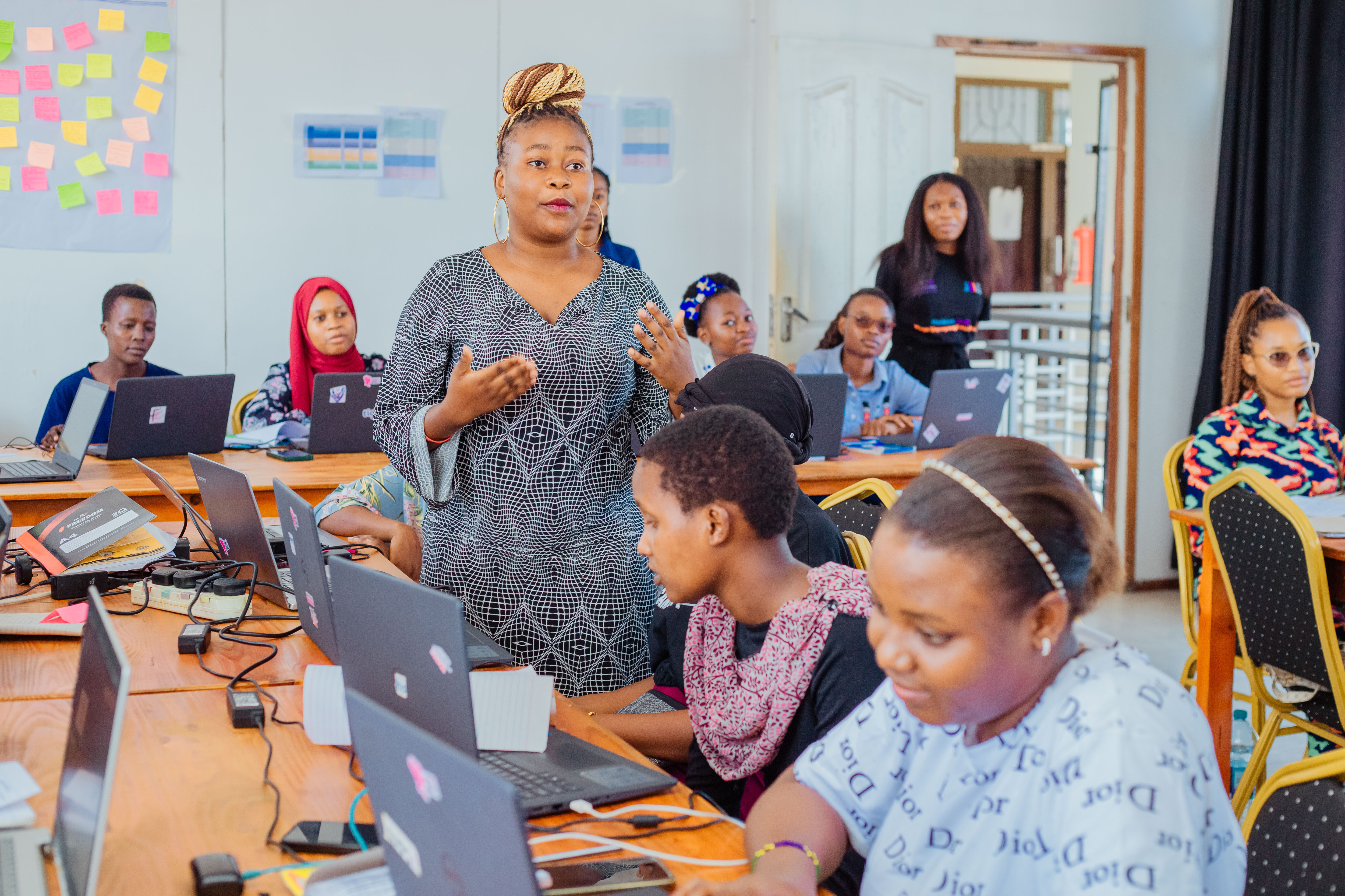 Girls presenting their tech projects